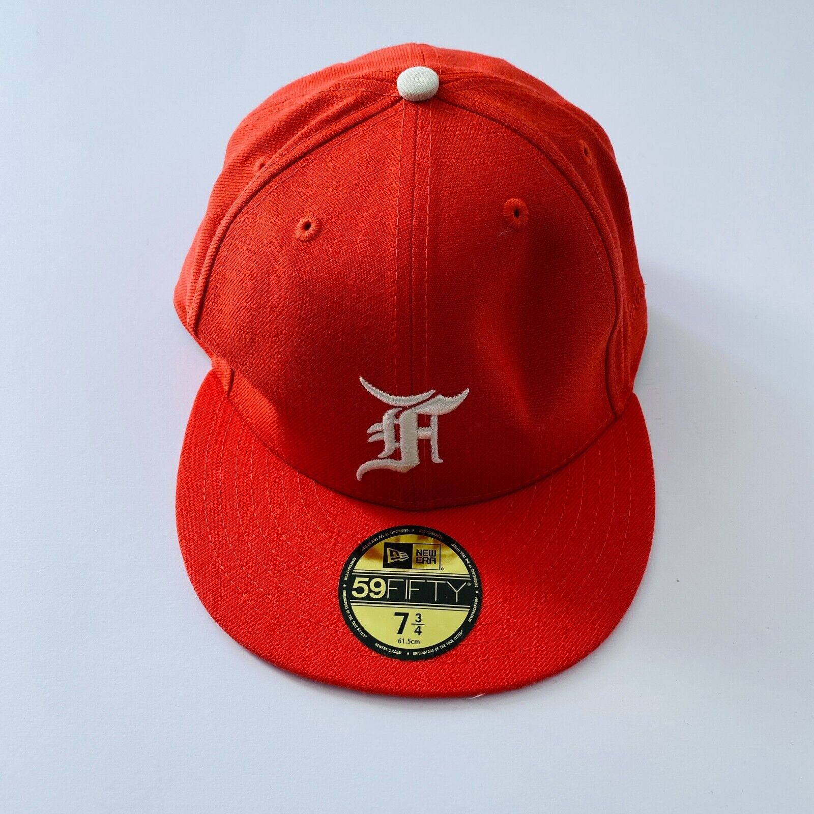 FEAR OF GOD ESSENTIALS NEW ERA 59FIFTY FITTED HAT ORANGE
