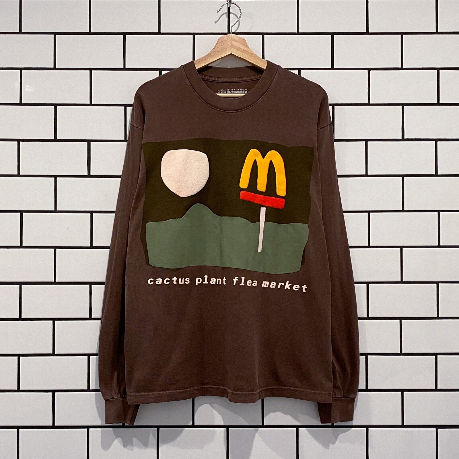 CACTUS PLANT FLEA MARKET CPFM X MCDONALDS 24/7 LS TEE BROWN LIMITED
