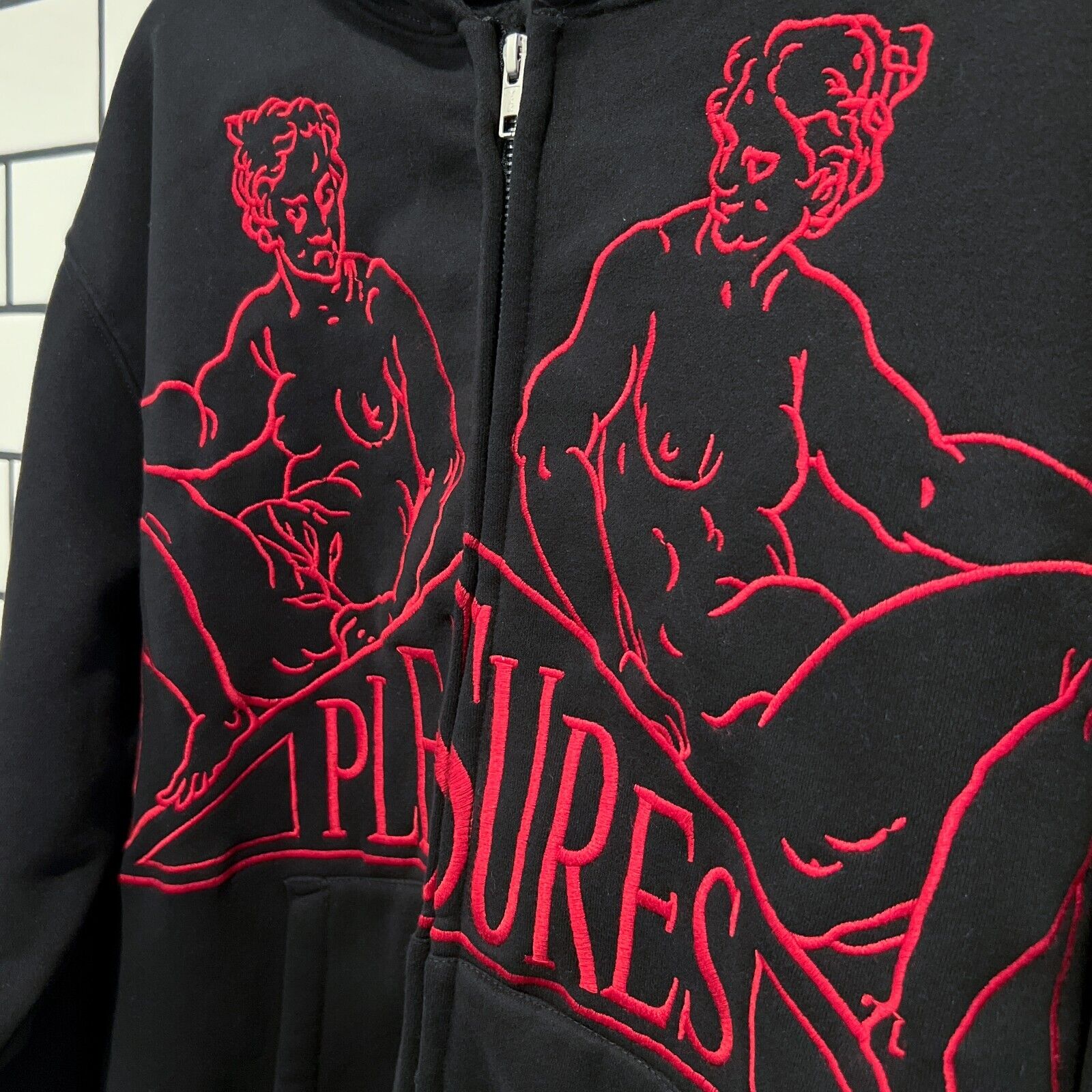 PLEASURES SQUEEZE ZIP UP HOODIE BLACK | shoparchive.us